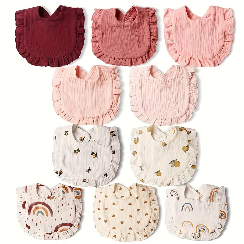 Baby Bibs in a Ten-Piece Mix of Solid Colors and Playful Prints with Ruffled Edges and Snap Closures