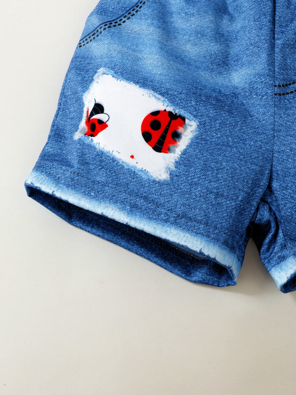 Baby Girl Ladybug Outfit Set with a Ruffle Sleeve Top and Blue Denim Look Shorts for Summer Casual Wear