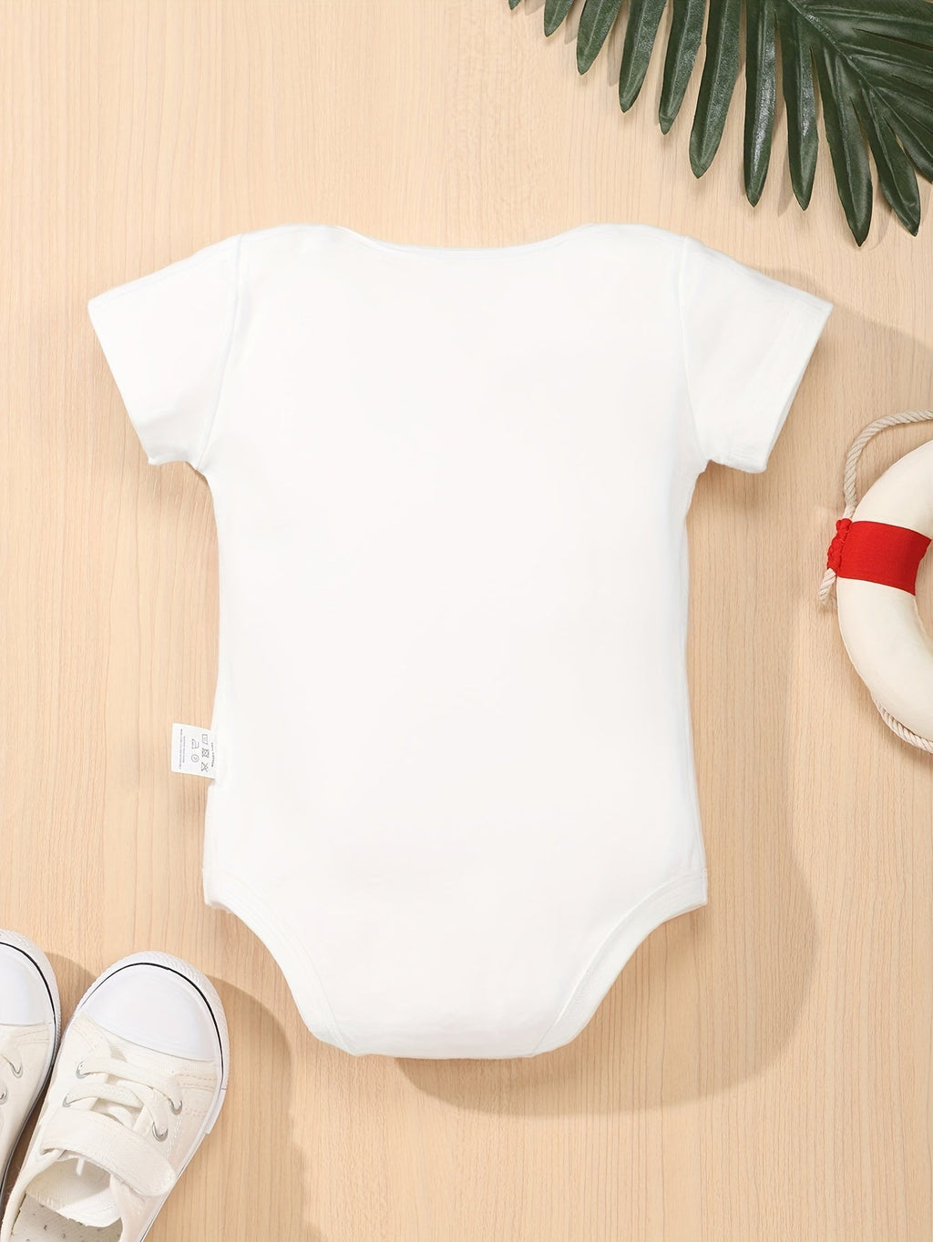 Baby Nine Months Slogan Bodysuit in White with Short Sleeves and Crotch Snaps for a Funny Everyday Outfit
