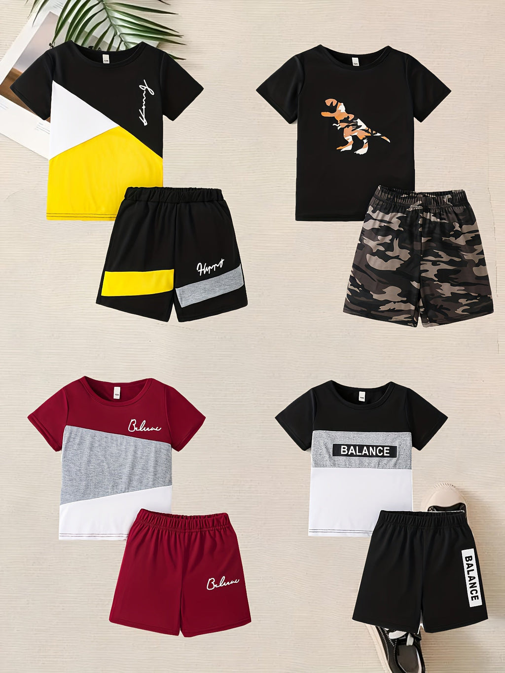 Boys' Eight-Piece Summer Outfit Set with Four Graphic T-Shirts and Four Shorts in Mixed Designs