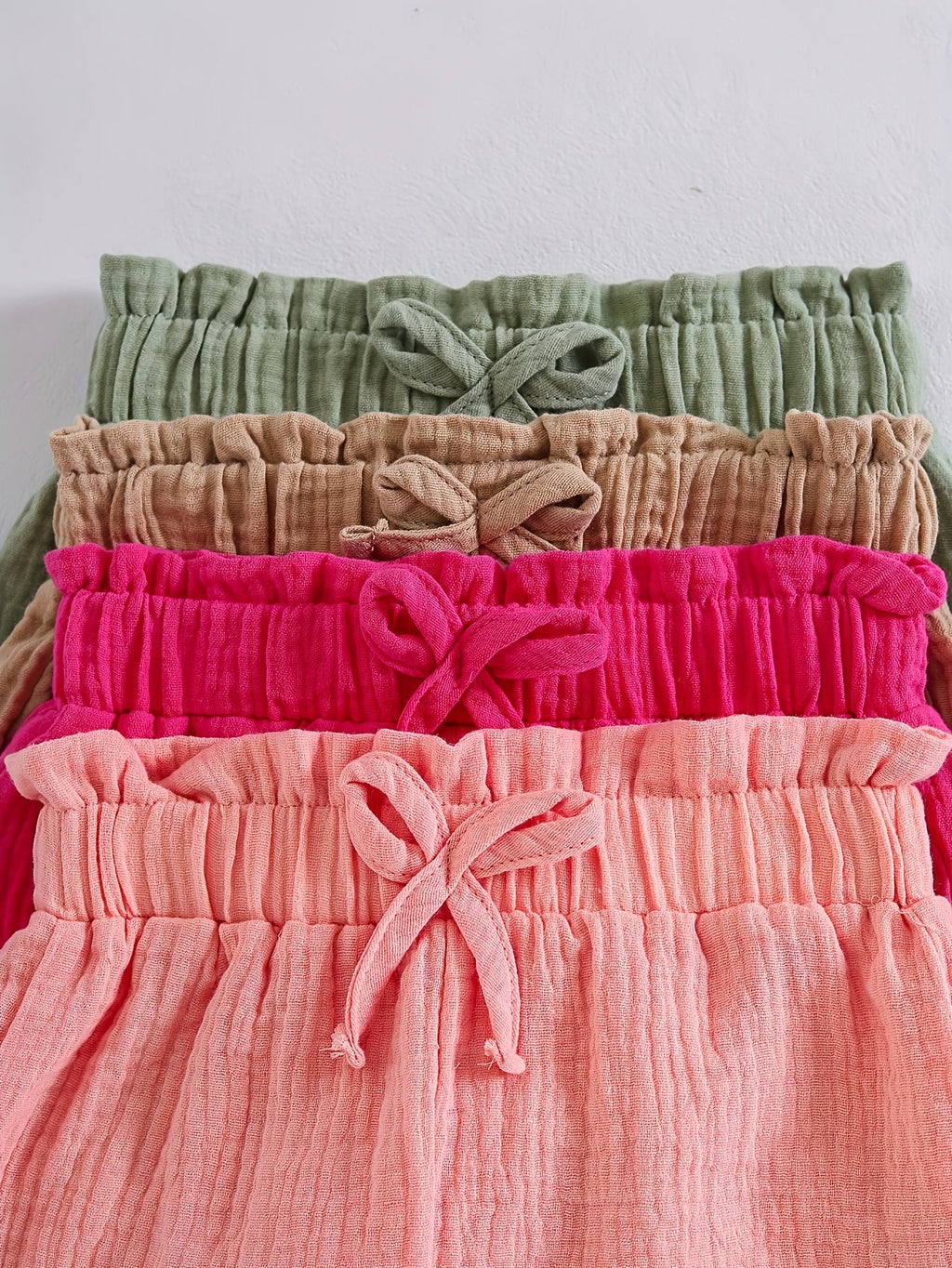 Girls Textured Shorts Four-Pack with Bow Details and Elastic Waists for Colorful Summer Casual Outfits