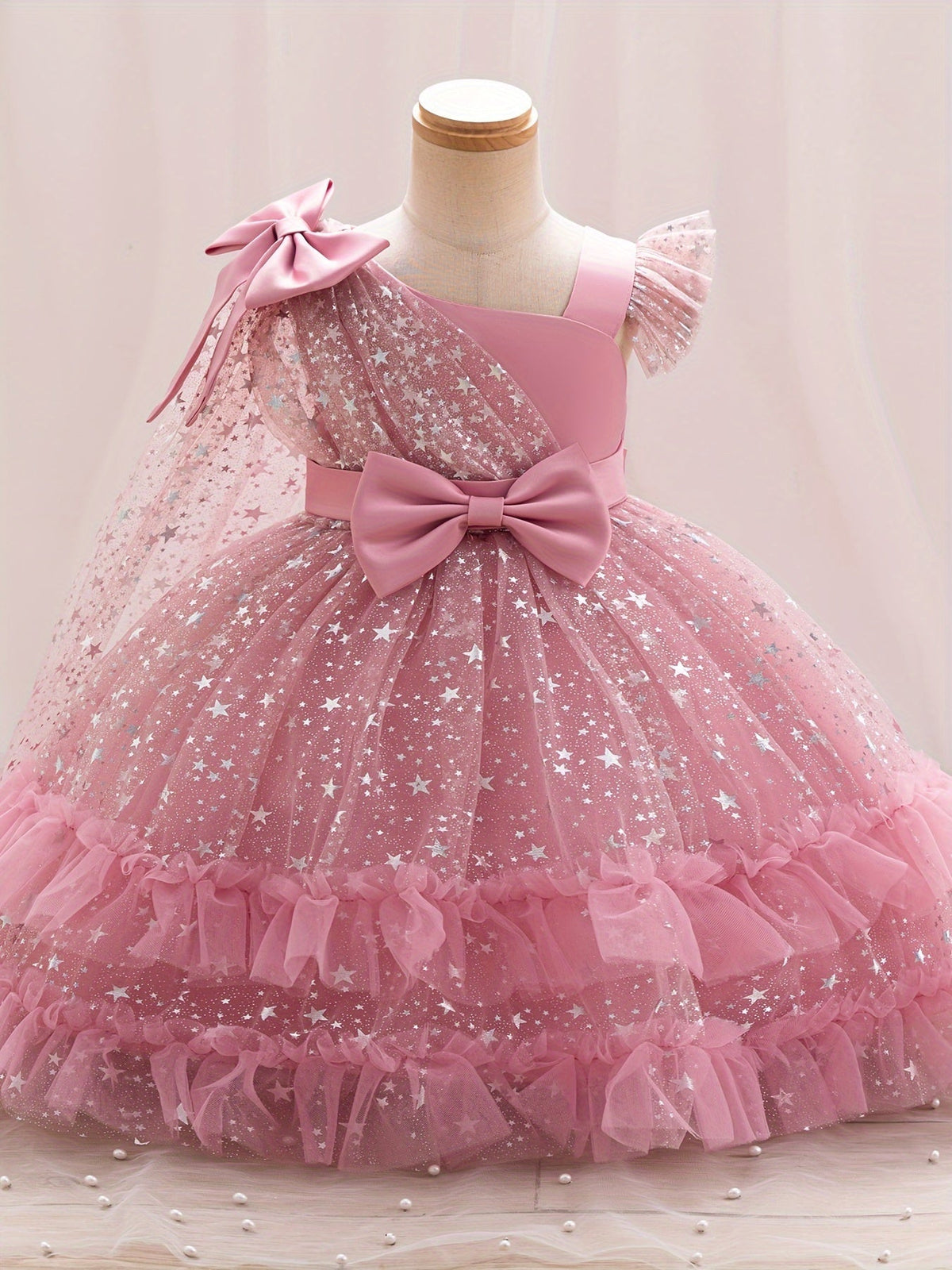 Girls' Star Tulle Party Dress with Large Bow Details and a Tiered Skirt for Birthdays and Celebrations