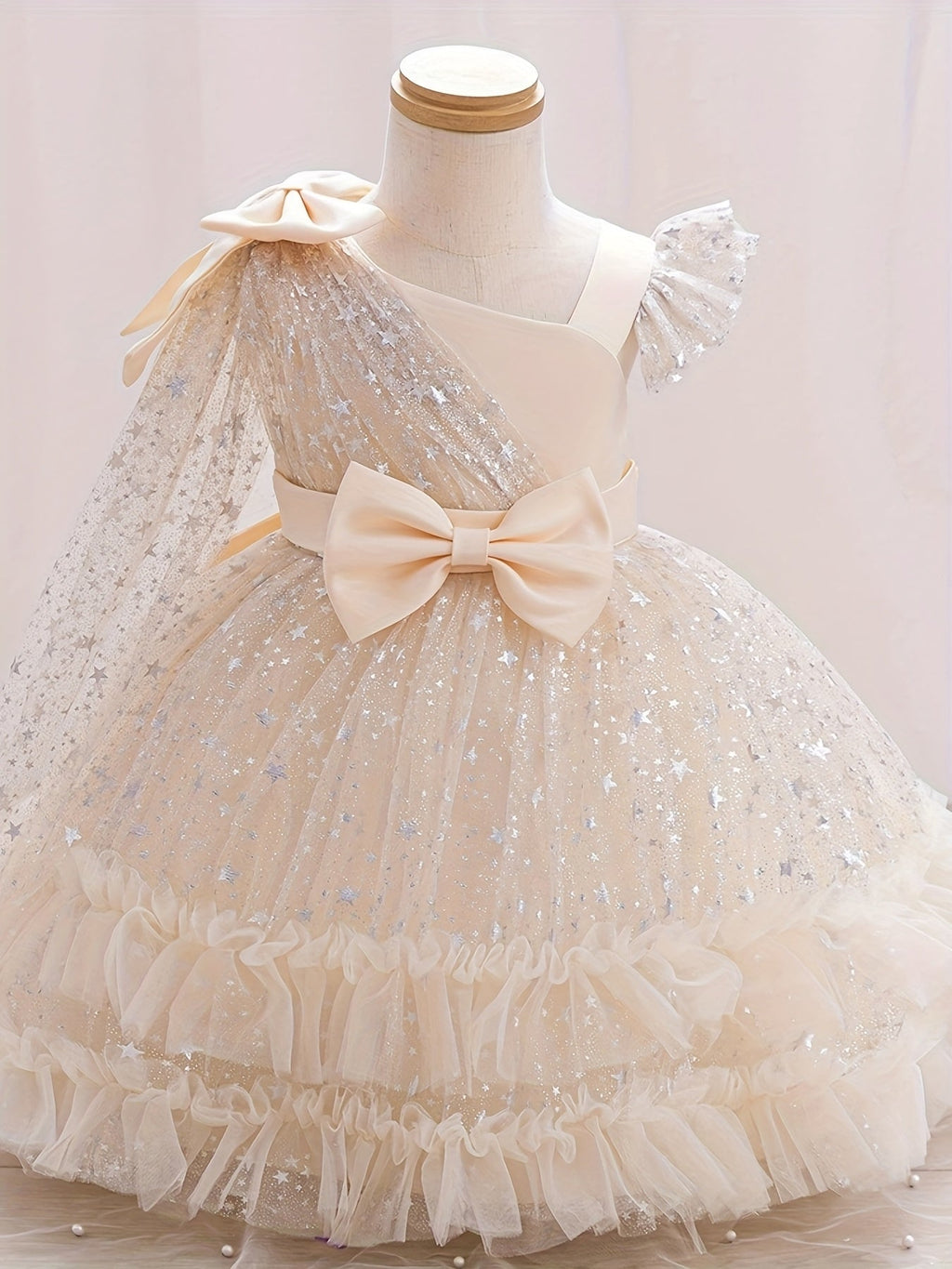 Girls' Star Tulle Party Dress with Large Bow Details and a Tiered Skirt for Birthdays and Celebrations