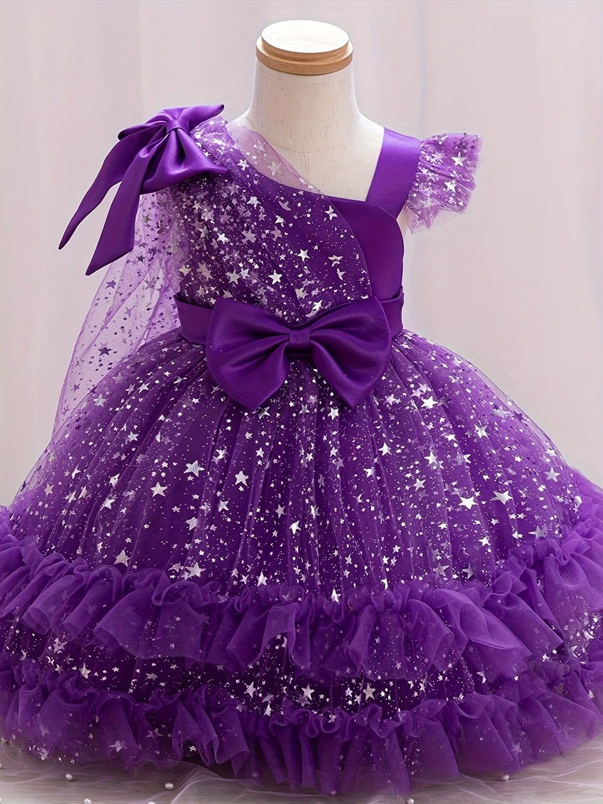 Girls' Star Tulle Party Dress with Large Bow Details and a Tiered Skirt for Birthdays and Celebrations