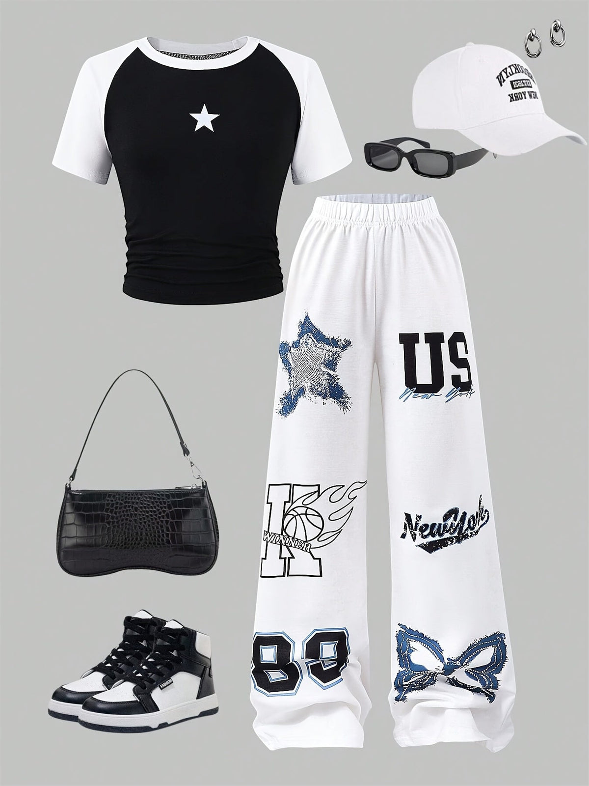 Girls' Star Print Pants Set with a Black and White Raglan Crop Tee and Graphic Wide Leg Trousers