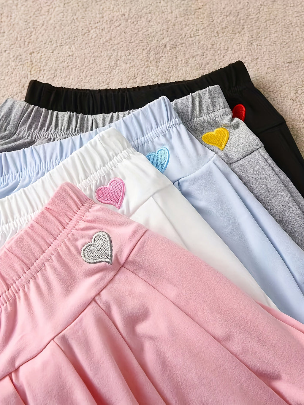 Girls' Pleated Skort 2-Pack in Random Colors with Built-In Shorts and Small Heart Patches at the Waist