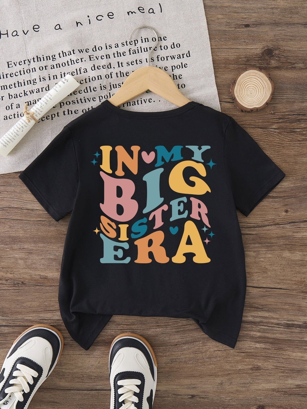 Girls' In My Big Sister Era T-Shirt in Black with a Butterfly Chest Print and Colorful Back Lettering