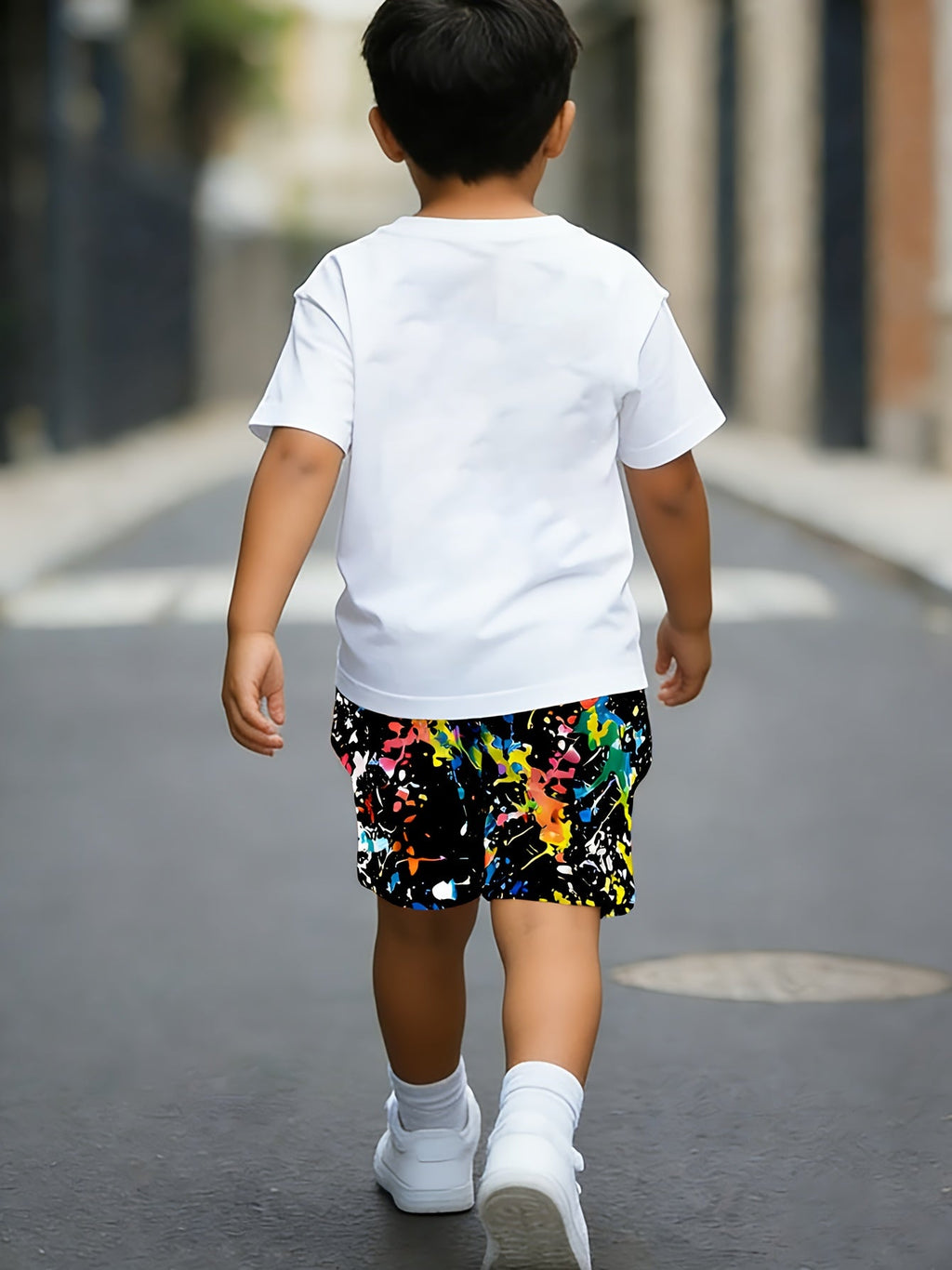 Kids' Graphic T-Shirt and Splatter Print Shorts Set with Colorful They Not Like Us Lettering for Summer