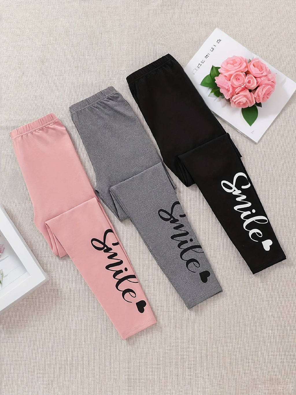 Girls' Smile Print Leggings Three Pack in Pink, Gray and Black with Elastic Waists for Everyday Layering