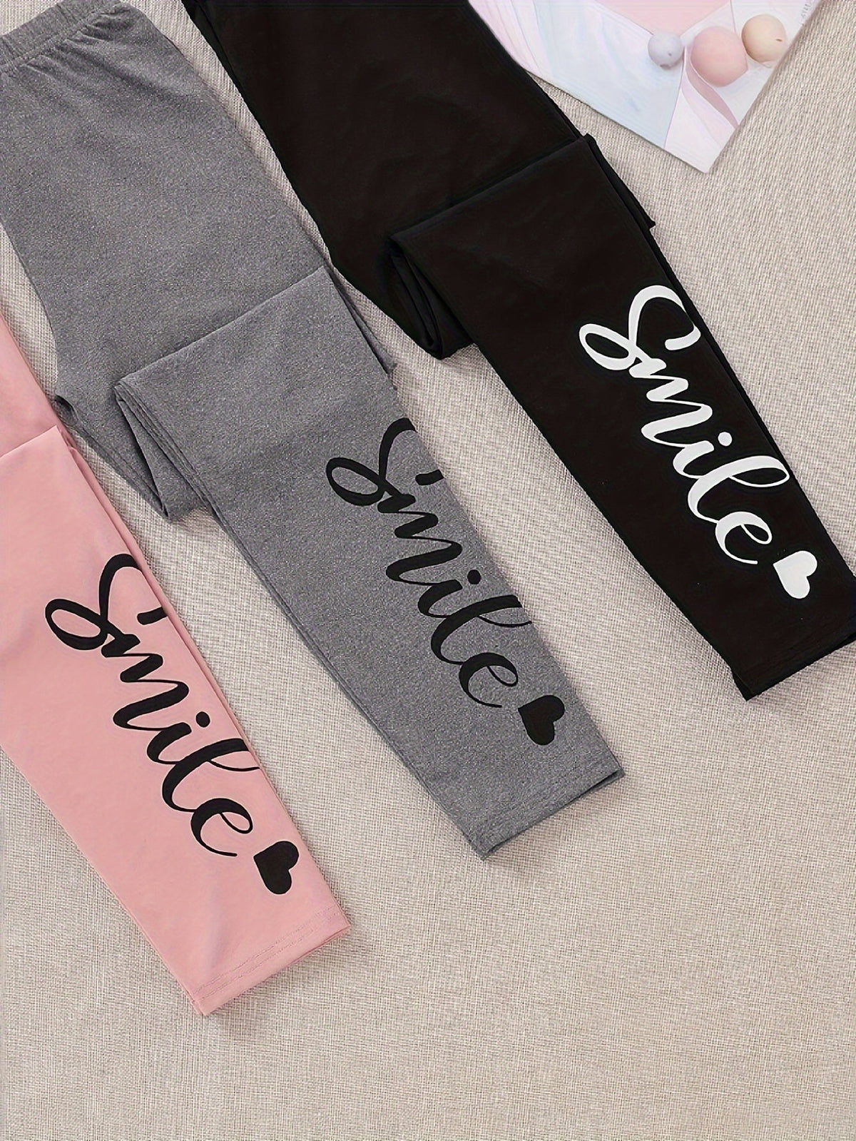 Girls' Smile Print Leggings Three Pack in Pink, Gray and Black with Elastic Waists for Everyday Layering